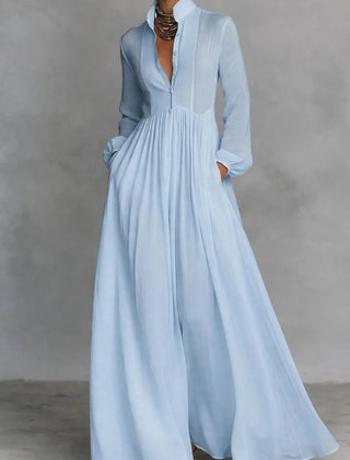 Blue Margaret maxi dress by THE WHITMORE FAMILY featuring a flowing fabric and button-front design.