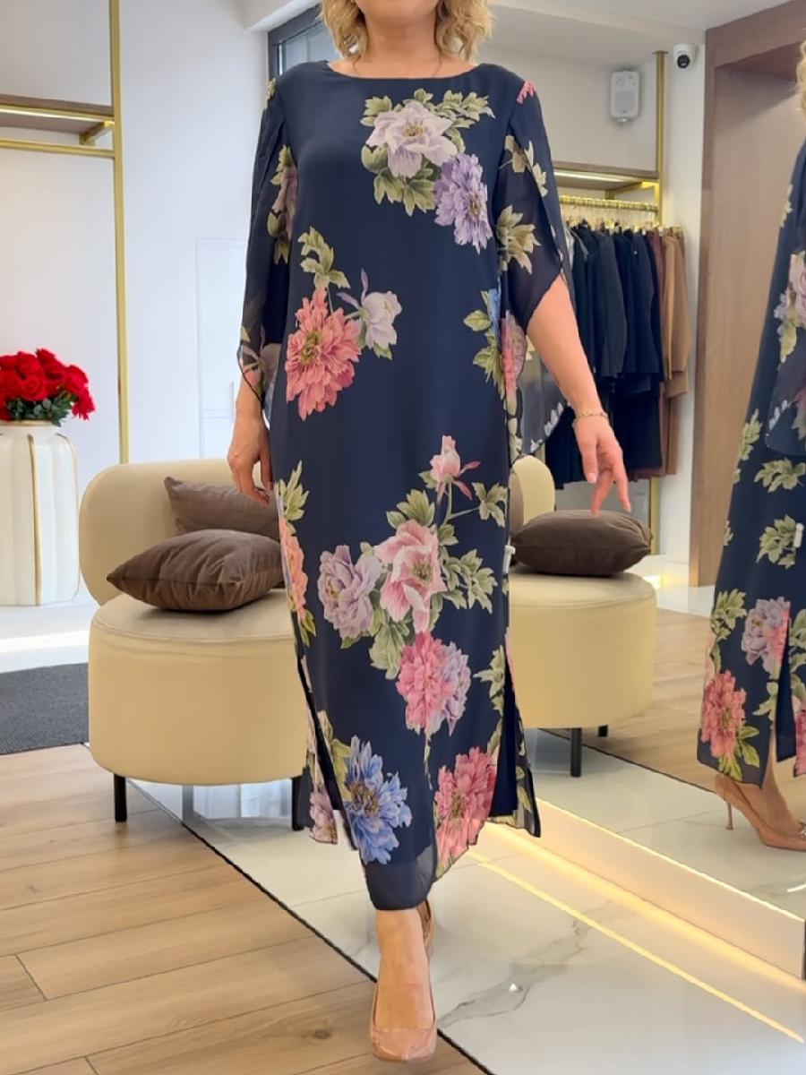 Blue Nancy floral loose maxi dress by THE WHITMORE FAMILY, flowing fabric with vibrant floral print and relaxed fit.