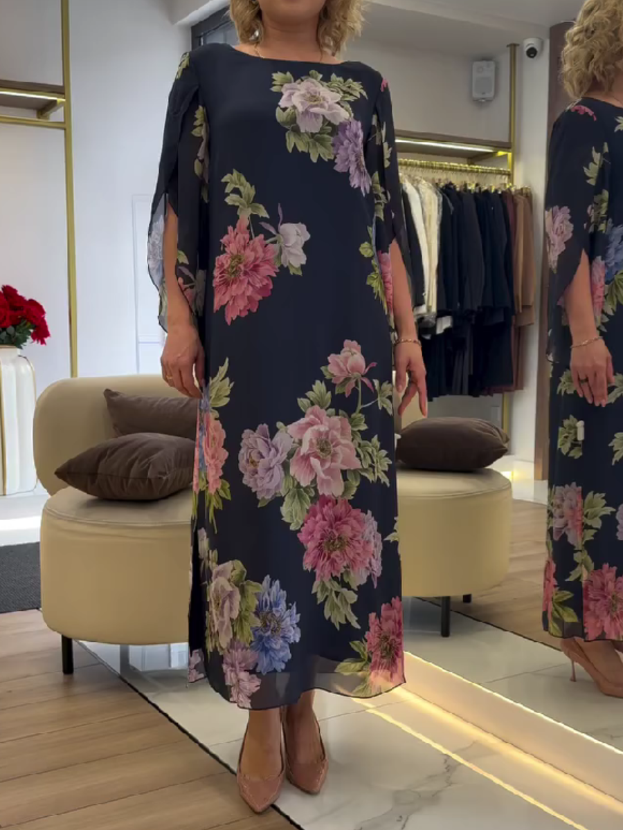 Nancy floral loose maxi dress by THE WHITMORE FAMILY, featuring blue fabric and a flowing, relaxed fit.