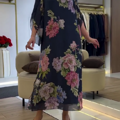 Nancy floral loose maxi dress by THE WHITMORE FAMILY, blue with a flowing, relaxed fit and floral pattern.