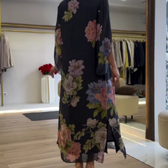 Nancy floral loose maxi dress by THE WHITMORE FAMILY, featuring a blue fabric with a flowing, relaxed fit and floral pattern.