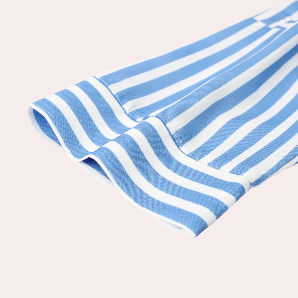 Noa relaxed striped shirt midi dress by THE WHITMORE FAMILY, featuring blue and white horizontal stripes and a comfortable fit.