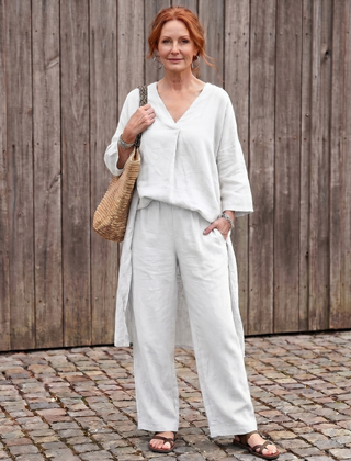 Onyx loose tunic top and wide-leg pant set by THE WHITMORE FAMILY, in blue, styled for a relaxed, elegant look.