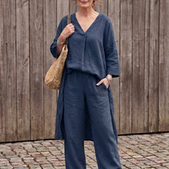 Blue loose tunic top and wide-leg pant set by THE WHITMORE FAMILY, styled for a relaxed, elegant look.