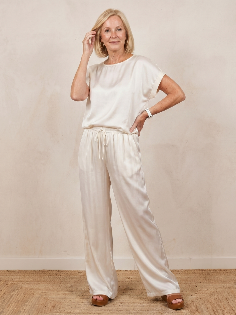 Shiloh short sleeve pants set by THE WHITMORE FAMILY featuring a drawstring waist and comfortable blue fabric.