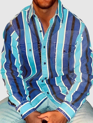 Victor Duval Vintage Odyssey Shirt by THE WHITMORE FAMILY, featuring retro-inspired fabric and classic button-down style.