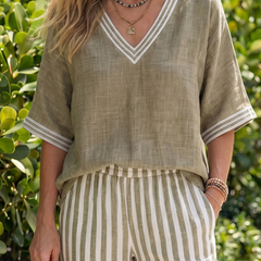 Blue Wren contrast V-neck tunic and stripe trouser set by THE WHITMORE FAMILY, shown on a model.