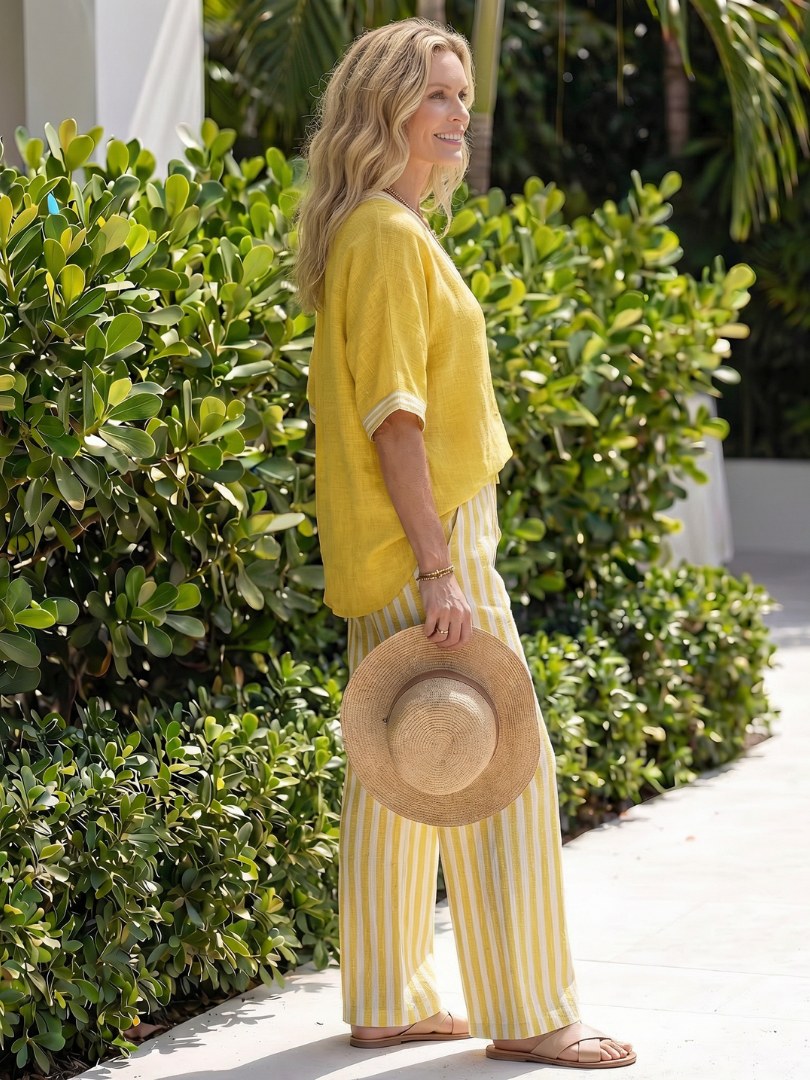Blue Wren contrast V-neck tunic and striped trouser set by THE WHITMORE FAMILY, stylish women’s coordinated outfit.