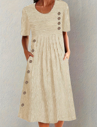 Blue Sofia™ striped summer dress by THE WHITMORE FAMILY, featuring a sleeveless design and casual fit for warm weather.