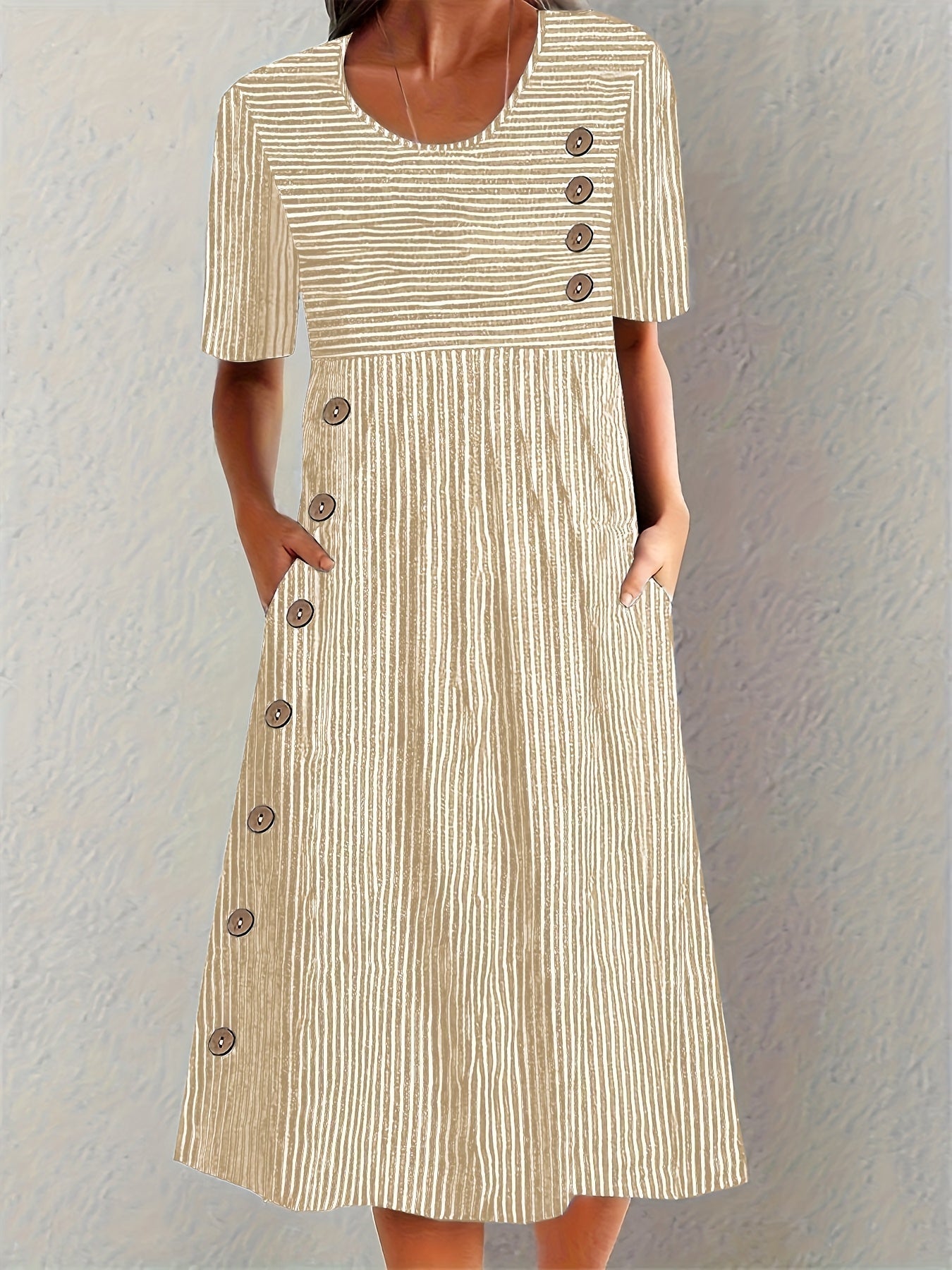 Blue Sofia™ striped summer dress by THE WHITMORE FAMILY, featuring a sleeveless design and casual fit for warm weather.