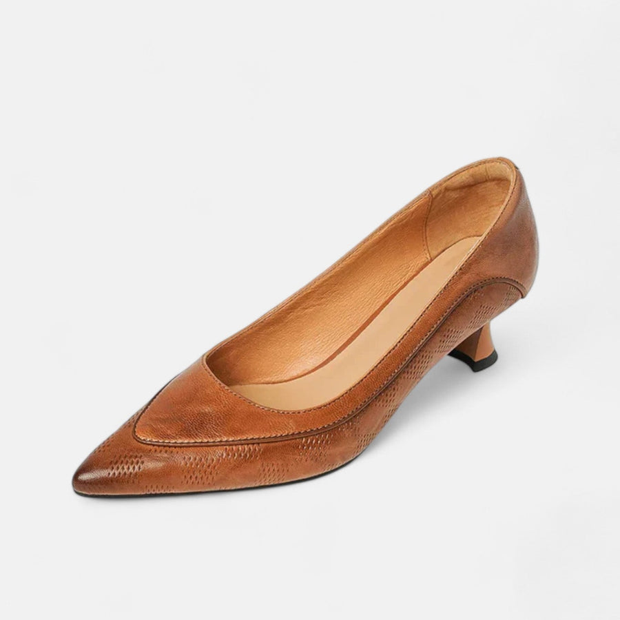 Brown leather Amara heels by THE WHITMORE FAMILY featuring a sleek design and pointed toe.