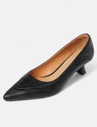 Brown leather heels from THE WHITMORE FAMILY's Amara collection, featuring a sleek design and pointed toe style.