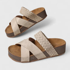 Brown Danyzelle™ orthopedic sandals by THE WHITMORE FAMILY with cushioned straps and supportive sole, ideal for comfortable walking.