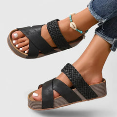 Brown Danyzelle™ orthopedic sandals by THE WHITMORE FAMILY with cushioned straps and supportive soles for comfortable wear.