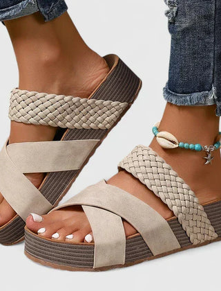 Brown Danyzelle™ orthopedic sandals by THE WHITMORE FAMILY with supportive straps and cushioned soles for comfort.