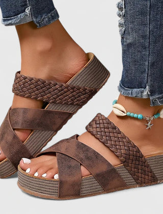 Brown Danyzelle™ orthopedic sandals by THE WHITMORE FAMILY with cushioned soles and adjustable straps for comfortable support.