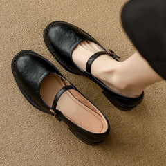 Brown Grace Classic Comfort Mary Janes by THE WHITMORE FAMILY, featuring a stylish design and comfortable fit for everyday wear.