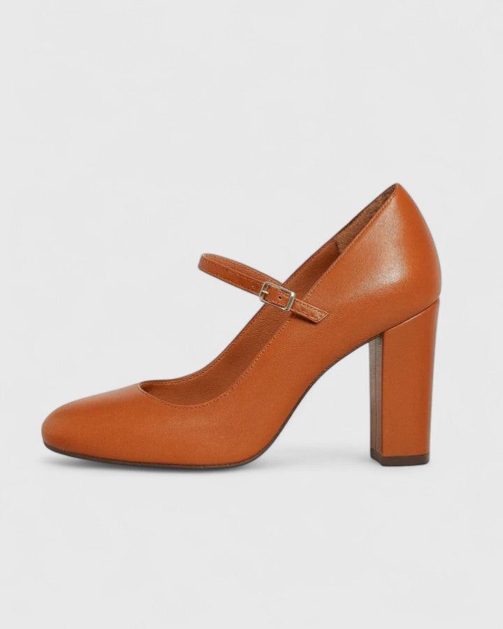 Brown Jamyrah sophisticated heels by THE WHITMORE FAMILY with elegant pointed toes and sleek design.