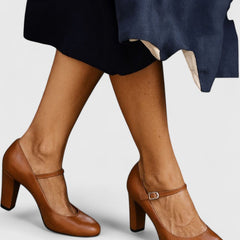 Brown Jamyrah sophisticated heels by THE WHITMORE FAMILY displayed on a neutral background.