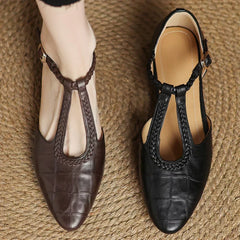 Brown Lily leather Mary Janes for girls by THE WHITMORE FAMILY, featuring classic style and comfortable design.