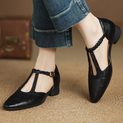 Brown leather Lily Mary Janes by THE WHITMORE FAMILY featuring classic strap design and soft, durable leather.