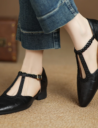 Brown leather Lily Mary Janes by THE WHITMORE FAMILY featuring classic strap design and soft, durable leather.