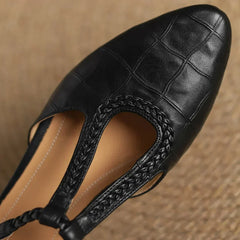 Brown Lily leather Mary Janes by THE WHITMORE FAMILY featuring classic design and comfortable fit for young children.