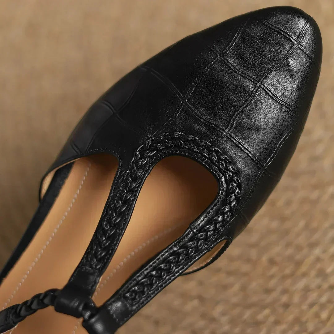 Brown Lily leather Mary Janes by THE WHITMORE FAMILY featuring classic design and comfortable fit for young children.