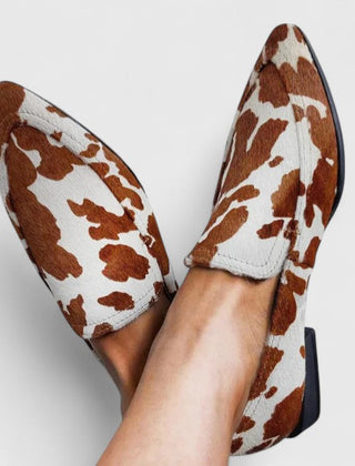 Brown Reniah comfortable loafers from THE WHITMORE FAMILY featuring a sleek slip-on design and cushioned interior.
