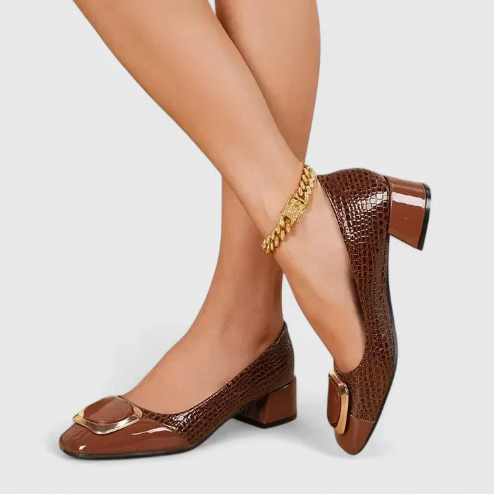 Brown Olyzabeth comfortable loafers by THE WHITMORE FAMILY, featuring a classic slip-on design and soft leather material.