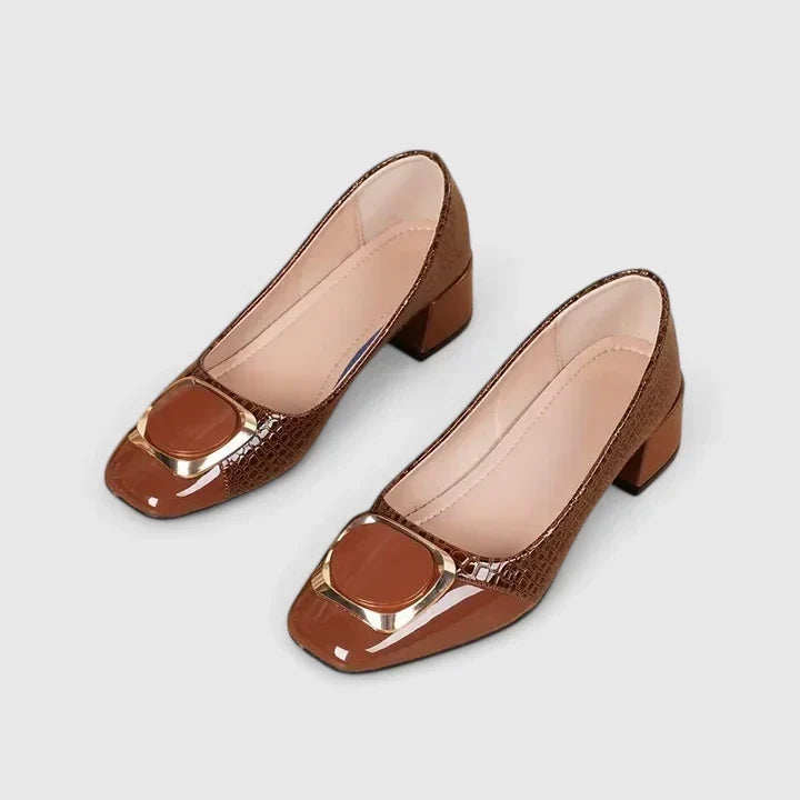 Brown Olyzabeth comfortable loafers by THE WHITMORE FAMILY, featuring a sleek design and cushioned fit for casual wear.