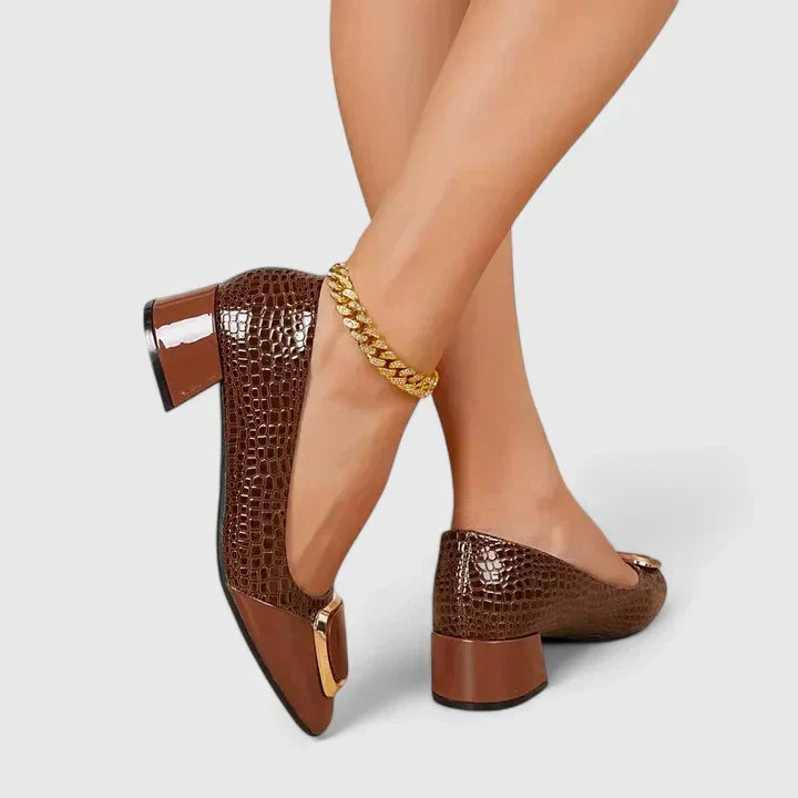 Brown Olyzabeth comfortable loafers by THE WHITMORE FAMILY featuring a sleek slip-on design and soft leather material.
