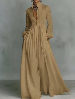 Brown Grace flowing button-front maxi dress by THE WHITMORE FAMILY, featuring a relaxed fit and elegant design.