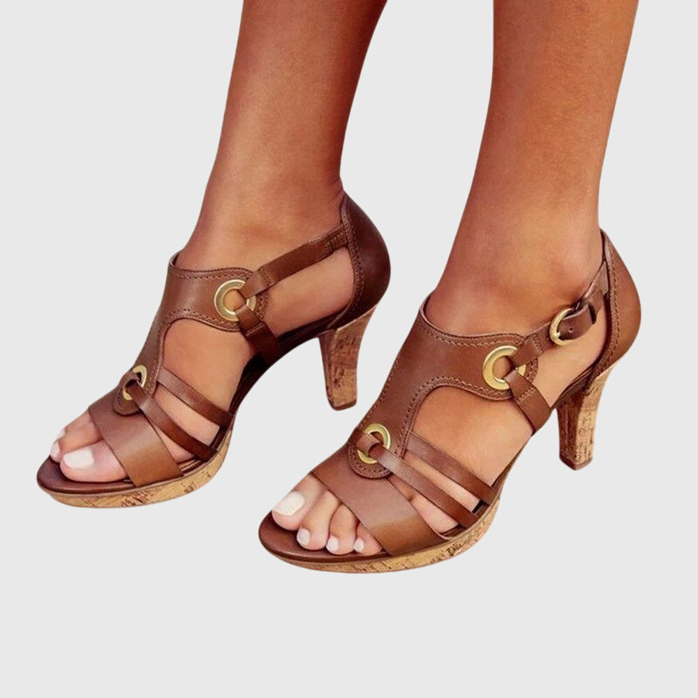 Brown Carla orthopaedic heels by THE WHITMORE FAMILY, featuring supportive design and stylish heel shape for comfortable wear.