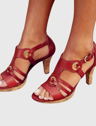 Brown Carla orthopaedic heels by THE WHITMORE FAMILY, featuring supportive design and stylish appearance.