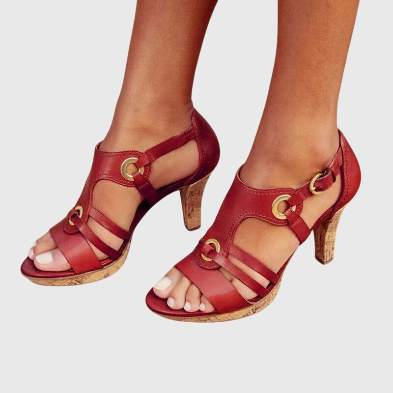 Brown Carla orthopaedic heels by THE WHITMORE FAMILY, featuring supportive design and stylish appearance.