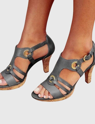 Brown Carla orthopaedic heels by THE WHITMORE FAMILY, showcasing stylish supportive footwear with a rounded toe and block heel.
