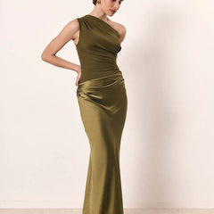 Ashley maxi dress by THE WHITMORE FAMILY in brown satin with a guilt detail, shown in a close-up of the elegant fabric and design.