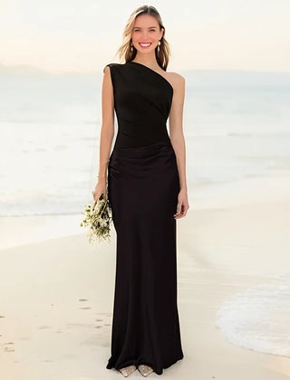 Ashley maxi dress in brown satin with a guilt detail from THE WHITMORE FAMILY, featuring a fitted bodice and flowing skirt.