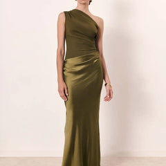 Ashley maxi dress by THE WHITMORE FAMILY, brown satin fabric with a guilt detail, shown on a model.