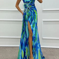 Blue Sandra vibrant draped dress by THE WHITMORE FAMILY, elegant bruiloftsgast outfit with flowing fabric and stylish design.