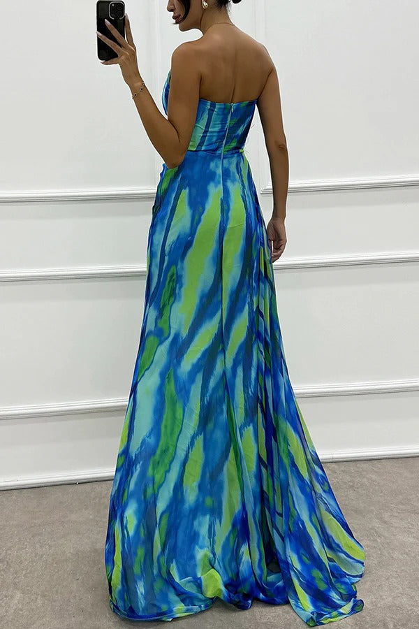 Blue Sandra Vibrant Draped Dress for wedding guest attire by THE WHITMORE FAMILY, shown on a model.