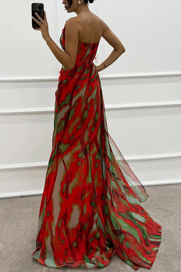 Blue Sandra vibrant draped dress by THE WHITMORE FAMILY, elegant for wedding guest attire, shown on a model.