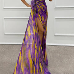 Sandra vibrant draped dress for wedding guest, blue color, by THE WHITMORE FAMILY, shown on a model.
