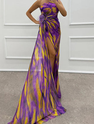 Sandra vibrant draped dress for wedding guest, blue color, by THE WHITMORE FAMILY, shown on a model.