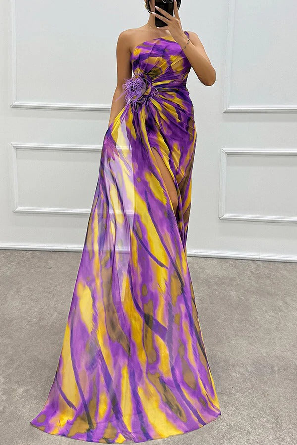 Blue vibrant draped dress by THE WHITMORE FAMILY, worn by a bridal guest in an elegant, flowing style for special occasions.