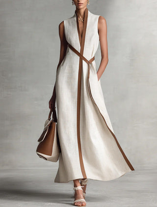 Burgundy Ashley sleeveless maxi dress by THE WHITMORE FAMILY, flowing fabric, fitted bodice, and ankle-length design.