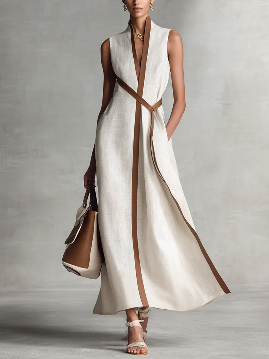 Burgundy Ashley sleeveless maxi dress by THE WHITMORE FAMILY, flowing fabric, fitted bodice, and ankle-length design.