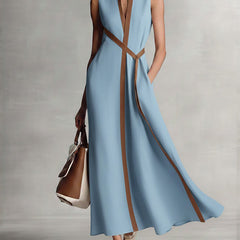 Burgundy Ashley sleeveless maxi dress by THE WHITMORE FAMILY, flowing length, fitted bodice, perfect for summer or formal occasions.