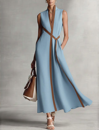 Burgundy Ashley sleeveless maxi dress by THE WHITMORE FAMILY, flowing length, fitted bodice, perfect for summer or formal occasions.